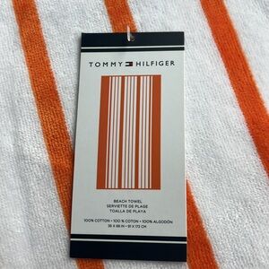 Enjoy the comfort and style of this new Tommy Hilfiger bath and beach towel.